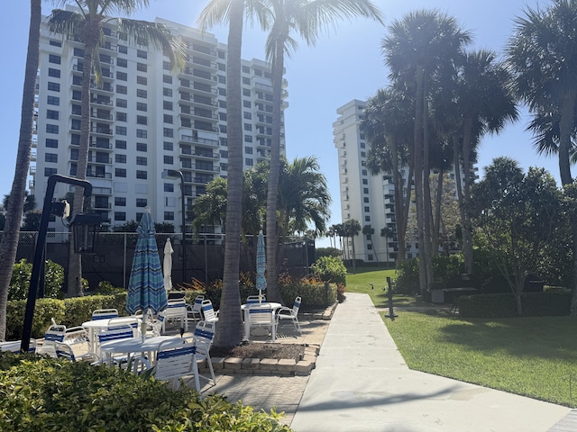 2003 N Ocean Blvd Unit 305N, Boca Raton, FL 33431 - surrounding community featuring a lawn