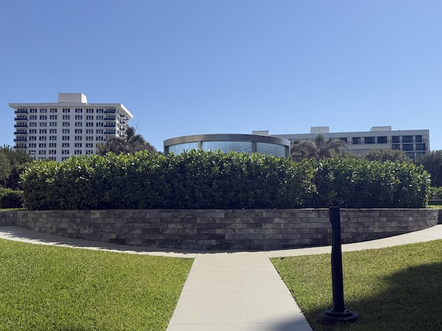 2003 N Ocean Blvd Unit 305N, Boca Raton, FL 33431 - view of home's community featuring a lawn