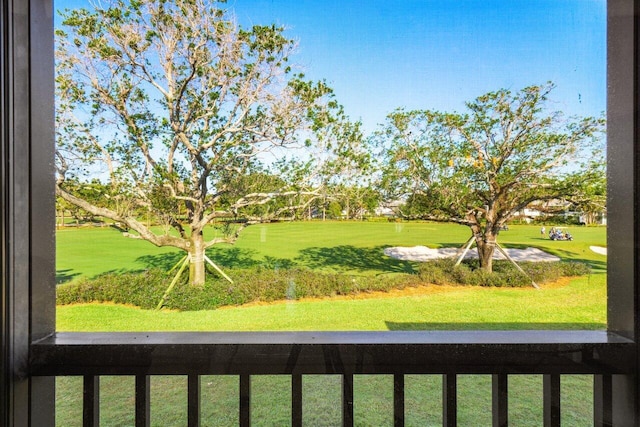 view of yard featuring a balcony