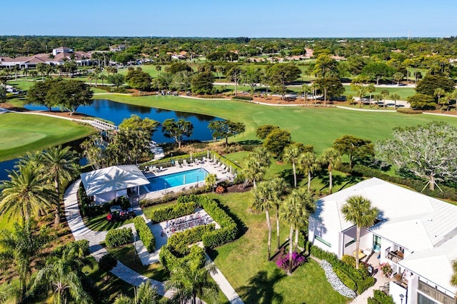 bird's eye view featuring golf course view and a water view