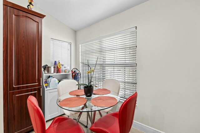 3251 Perimeter Dr, Greenacres, FL 33467 - dining room featuring baseboards