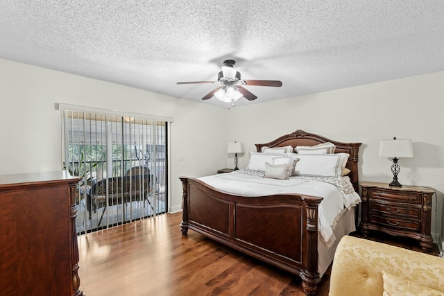 3251 Perimeter Dr, Greenacres, FL 33467 - bedroom with a ceiling fan, access to exterior, wood finished floors, and a textured ceiling