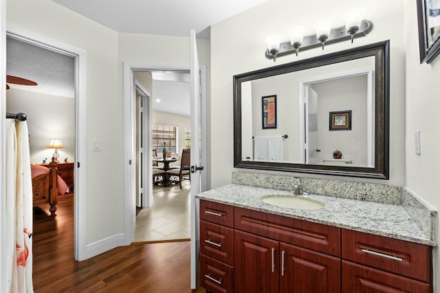 3251 Perimeter Dr, Greenacres, FL 33467 - bathroom featuring vanity and wood finished floors