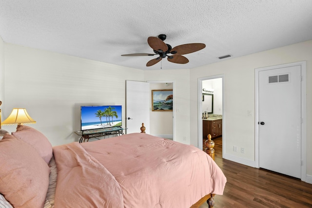 3251 Perimeter Dr, Greenacres, FL 33467 - bedroom with visible vents, a textured ceiling, dark wood-type flooring, and baseboards