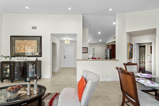 3251 Perimeter Dr, Greenacres, FL 33467 - living area featuring visible vents, recessed lighting, baseboards, light tile patterned floors, and lofted ceiling