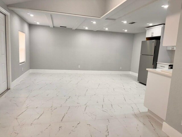 interior space with recessed lighting, visible vents, marble finish floor, and baseboards
