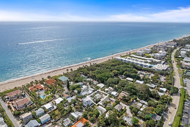 aerial view with a view of the beach and a water view