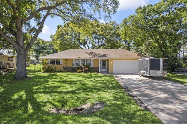 7003 Arthurs Rd, Fort Pierce, FL 34951 - ranch-style house featuring stucco siding, driveway, an attached garage, and a front yard