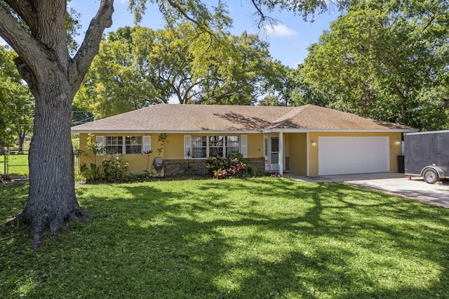7003 Arthurs Rd, Fort Pierce, FL 34951 - ranch-style home with fence, driveway, stucco siding, a front lawn, and a garage