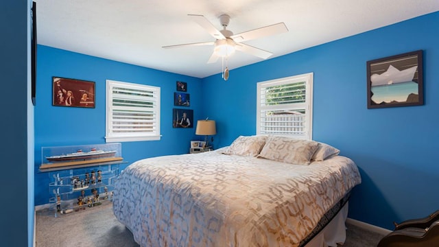 4142 NE Robin Ct, Jensen Beach, FL 34957 - carpeted bedroom featuring a ceiling fan and baseboards