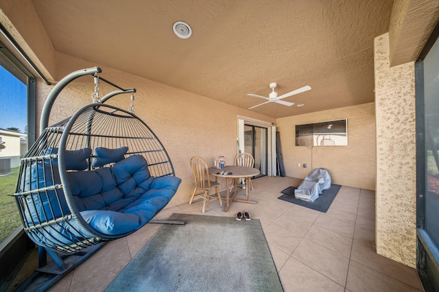 view of patio / terrace featuring a balcony and a ceiling fan