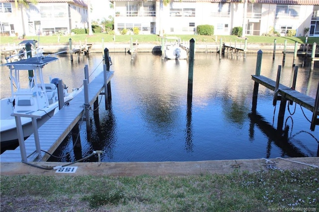 dock area featuring a water view