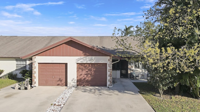 view of front of house featuring driveway and a garage