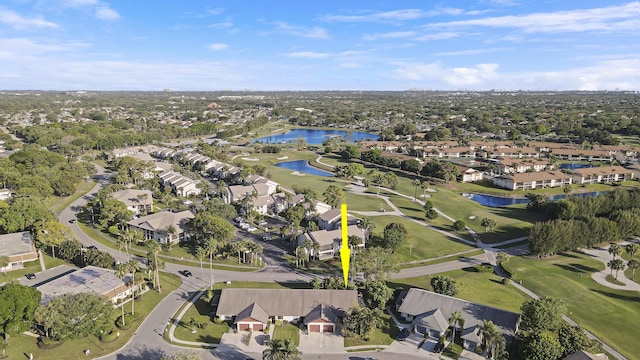 bird's eye view featuring a residential view, a water view, and golf course view