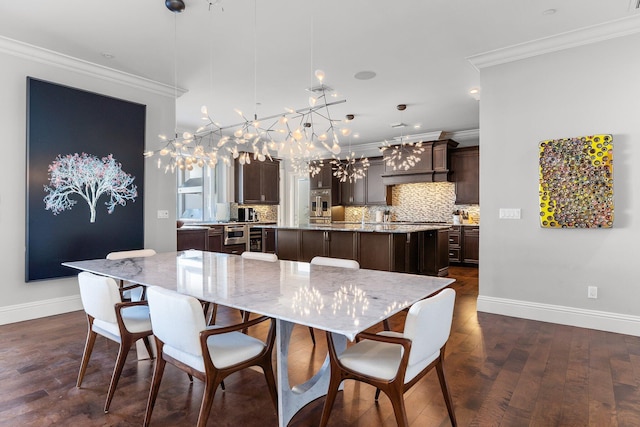 dining room with baseboards, a notable chandelier, dark wood-style flooring, and crown molding
