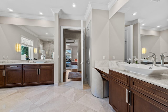 bathroom with a sink, a shower stall, and recessed lighting