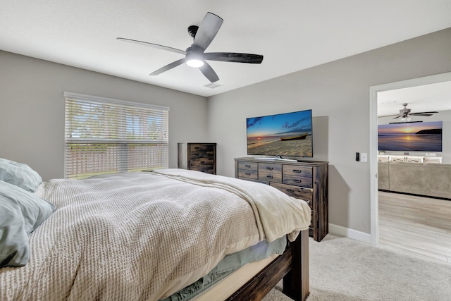 3558 SW Pisano St, Port Saint Lucie, FL 34953 - bedroom with baseboards, carpet floors, and ceiling fan