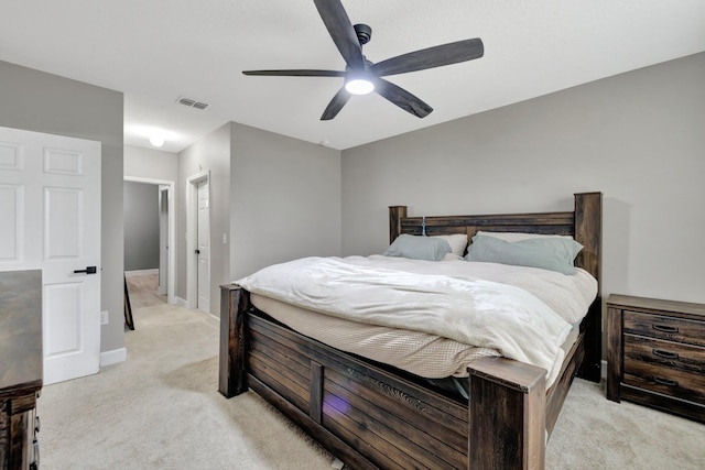 3558 SW Pisano St, Port Saint Lucie, FL 34953 - bedroom featuring light carpet, visible vents, ceiling fan, and baseboards