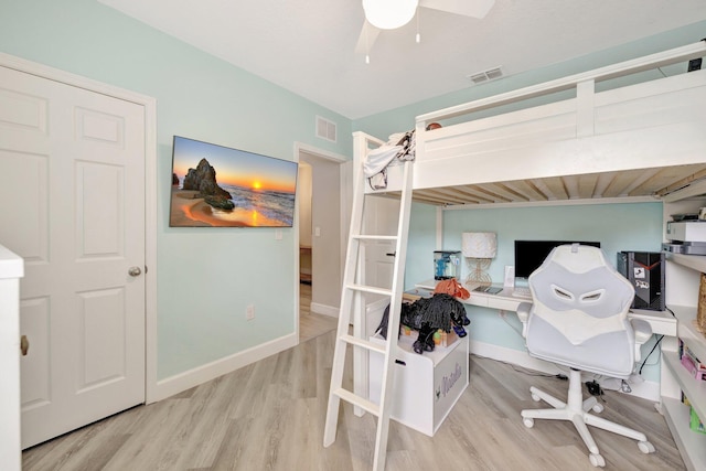 3558 SW Pisano St, Port Saint Lucie, FL 34953 - bedroom with visible vents, a ceiling fan, baseboards, and wood finished floors