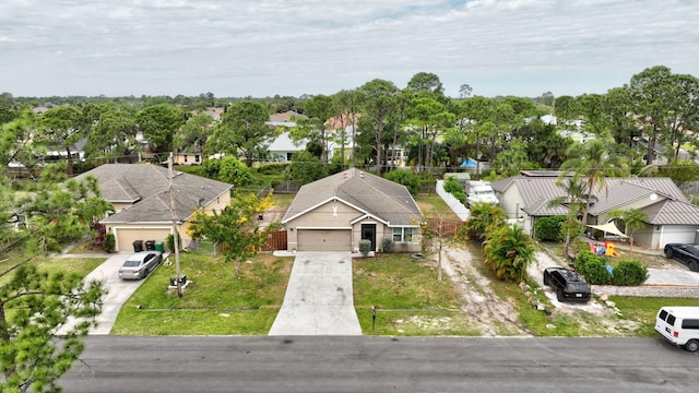 3558 SW Pisano St, Port Saint Lucie, FL 34953 - birds eye view of property with a residential view