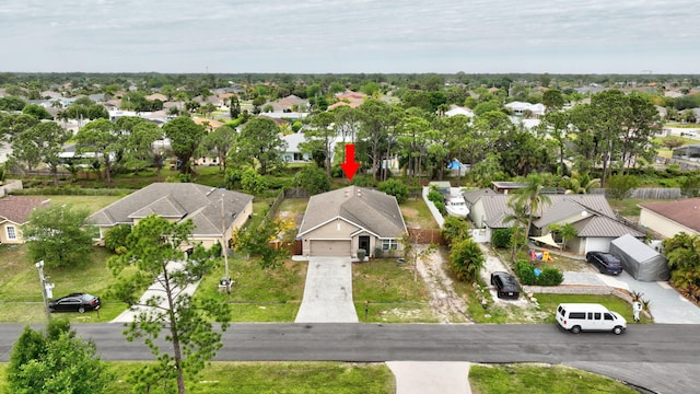 3558 SW Pisano St, Port Saint Lucie, FL 34953 - drone / aerial view featuring a residential view