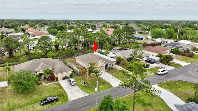 3558 SW Pisano St, Port Saint Lucie, FL 34953 - birds eye view of property featuring a residential view