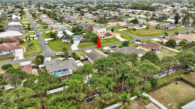 3558 SW Pisano St, Port Saint Lucie, FL 34953 - birds eye view of property featuring a residential view