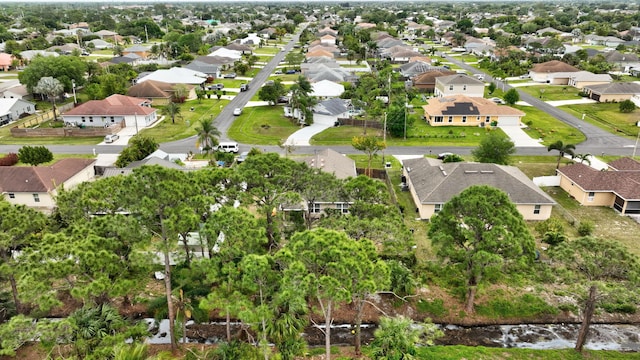 3558 SW Pisano St, Port Saint Lucie, FL 34953 - bird's eye view with a residential view