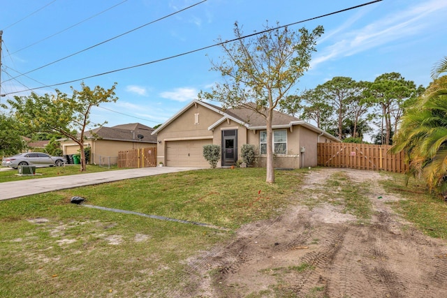 3558 SW Pisano St, Port Saint Lucie, FL 34953 - view of front of house with stucco siding, a gate, fence, concrete driveway, and an attached garage