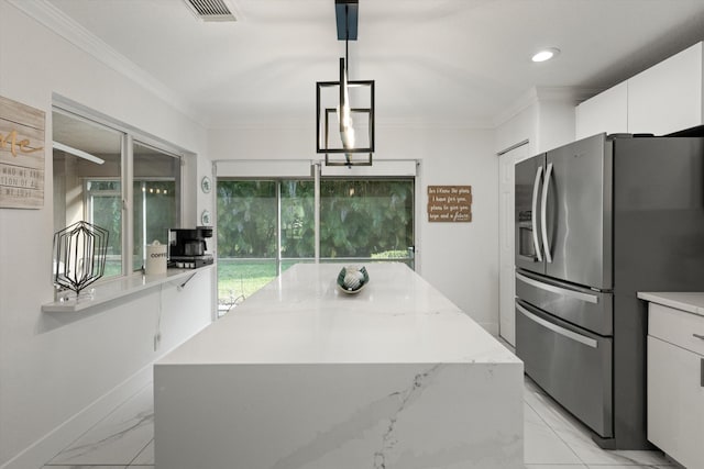 kitchen with visible vents, stainless steel fridge with ice dispenser, ornamental molding, marble finish floor, and white cabinetry