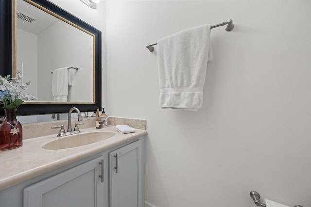 bathroom featuring visible vents and vanity