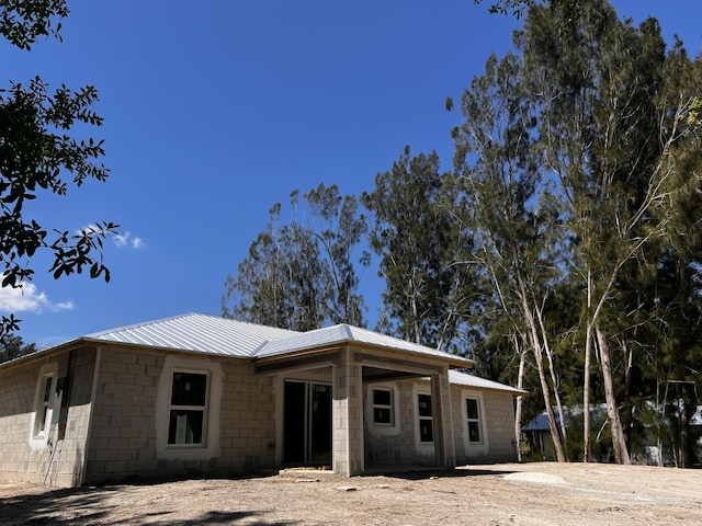 3897 NW 19th Ave, Okeechobee, FL 34972 - view of front facade with metal roof and concrete block siding