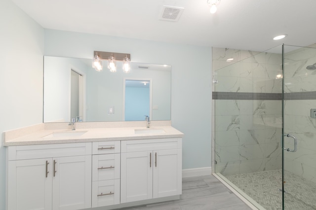 3897 NW 19th Ave, Okeechobee, FL 34972 - full bathroom with visible vents, a marble finish shower, marble finish floor, and a sink