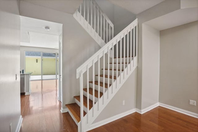 155 Waterford Dr, Jupiter, FL 33458 - stairs with wood-type flooring and baseboards