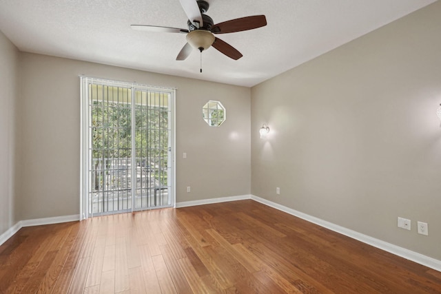 155 Waterford Dr, Jupiter, FL 33458 - unfurnished room with a ceiling fan, wood finished floors, and baseboards