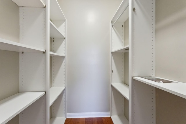 155 Waterford Dr, Jupiter, FL 33458 - walk in closet with wood finished floors