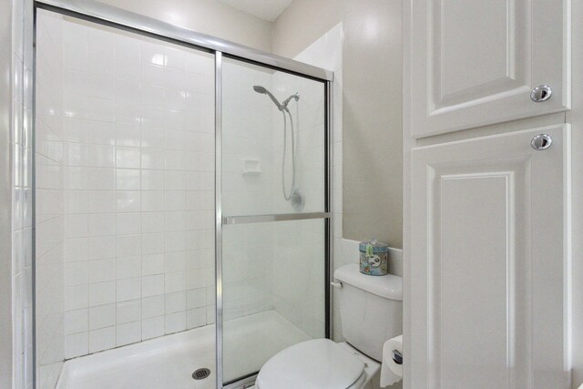 155 Waterford Dr, Jupiter, FL 33458 - full bathroom featuring a stall shower and toilet