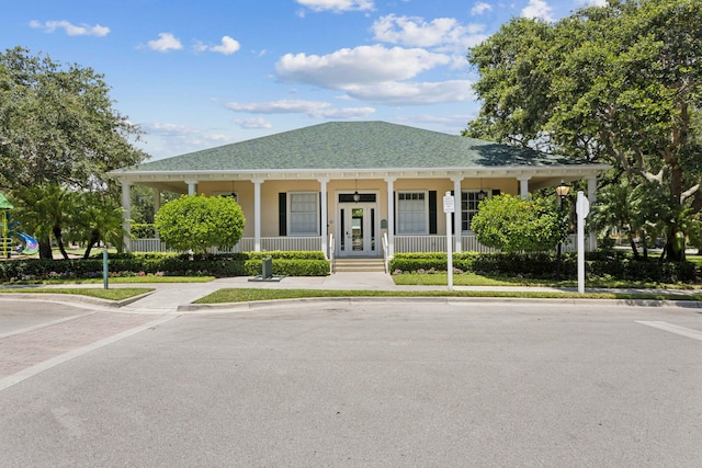 155 Waterford Dr, Jupiter, FL 33458 - view of front facade with a porch