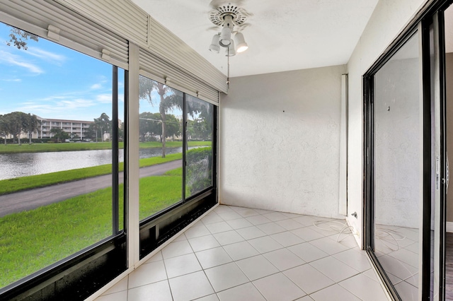 7300 Amberly Ln Unit 101, Delray Beach, FL 33446 - unfurnished sunroom with a ceiling fan and a water view