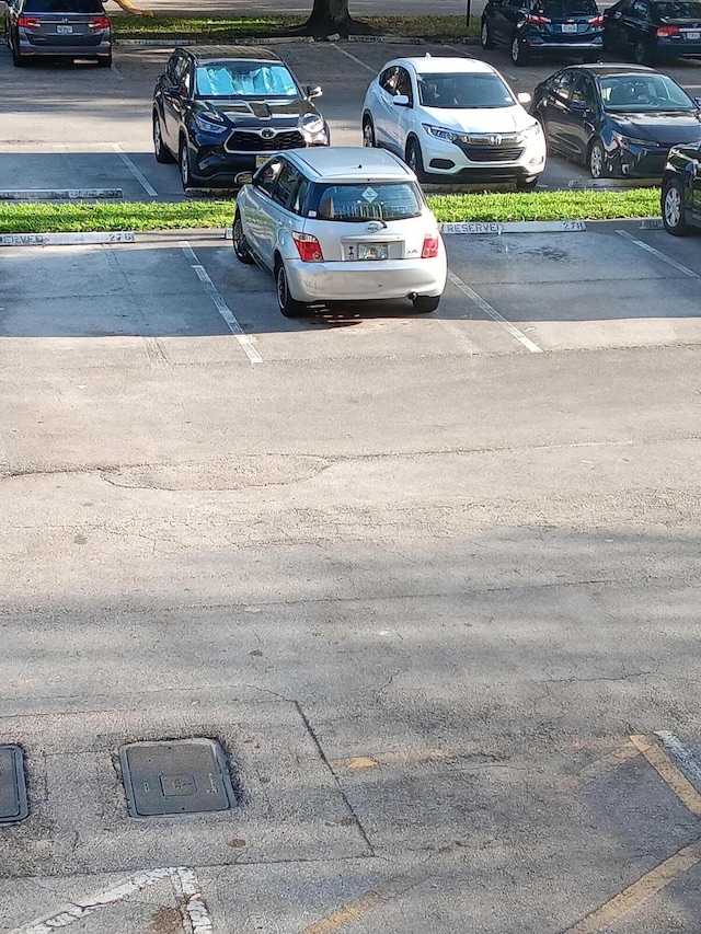3450 Blue Lake Dr Unit 204, Pompano Beach, FL 33064 - view of uncovered parking lot