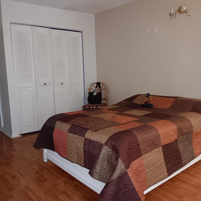 3450 Blue Lake Dr Unit 204, Pompano Beach, FL 33064 - bedroom with wood finished floors and a closet