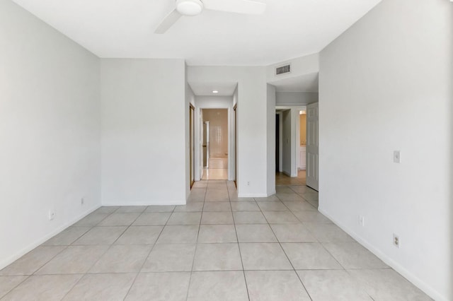 7857 Lexington Club Blvd Unit A, Delray Beach, FL 33446 - empty room with light tile patterned flooring, ceiling fan, visible vents, and baseboards