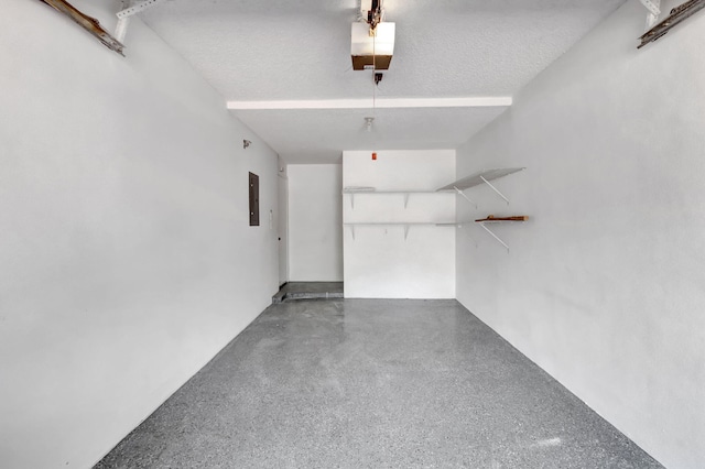 7857 Lexington Club Blvd Unit A, Delray Beach, FL 33446 - garage with a garage door opener and electric panel