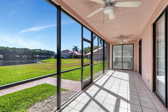 7857 Lexington Club Blvd Unit A, Delray Beach, FL 33446 - unfurnished sunroom with a water view and ceiling fan