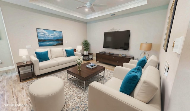 9525 SW Royal Poinciana Dr, Port Saint Lucie, FL 34987 - living area with ornamental molding, a tray ceiling, wood finished floors, baseboards, and ceiling fan