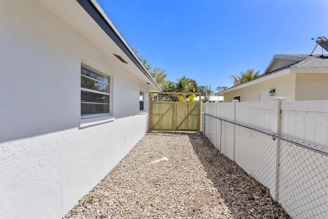 6887 Osborne Dr, Lake Worth, FL 33462 - view of yard with a gate