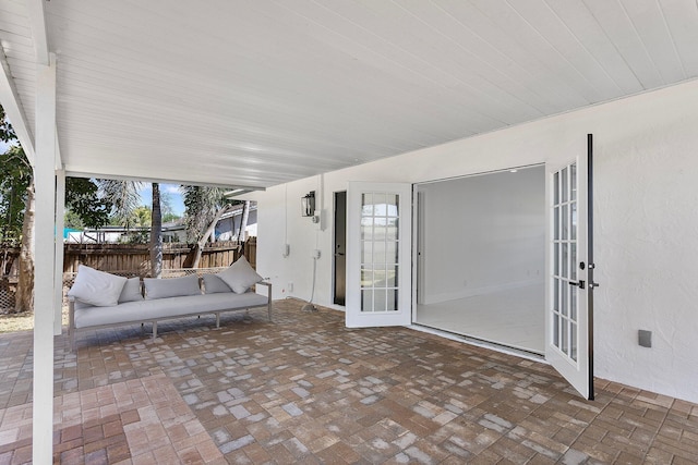 6887 Osborne Dr, Lake Worth, FL 33462 - view of patio / terrace with french doors