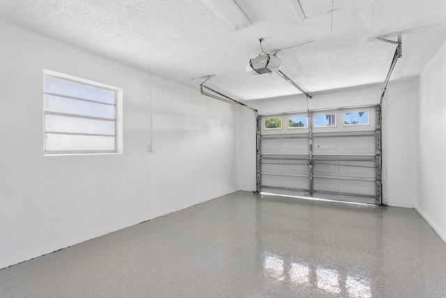 6887 Osborne Dr, Lake Worth, FL 33462 - garage featuring a garage door opener