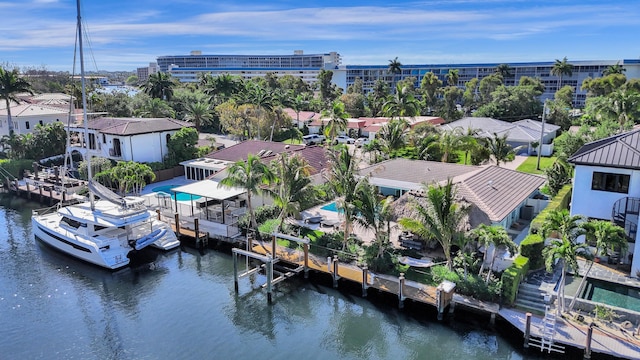birds eye view of property featuring a water view