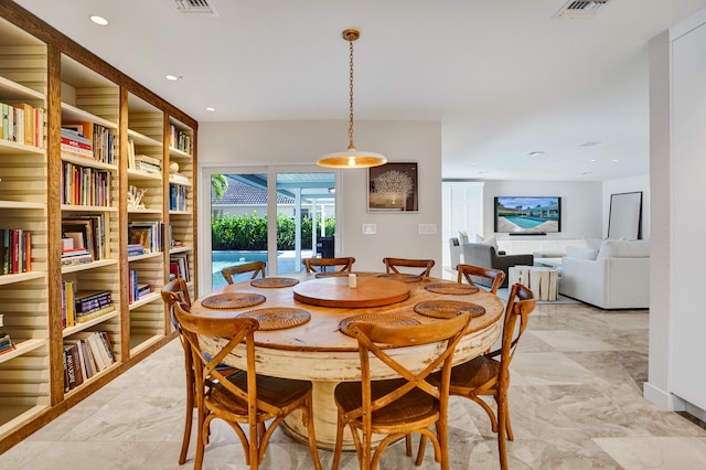 dining room featuring visible vents and recessed lighting